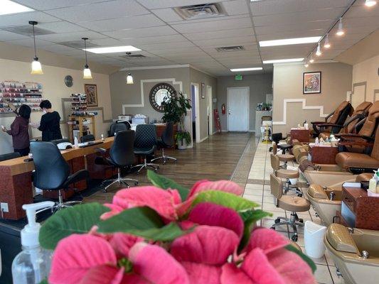 The nail bar and pedi chairs