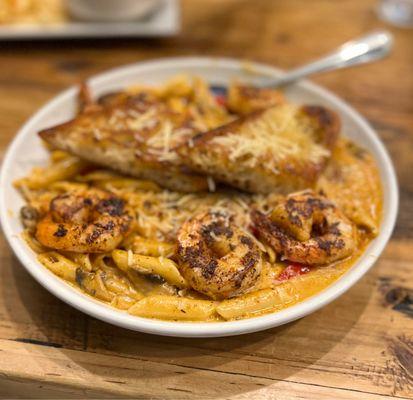 Cajun Shrimp Pasta - 5/5 Excellent, full of flavor. Mild spicy. Served with garlic bread