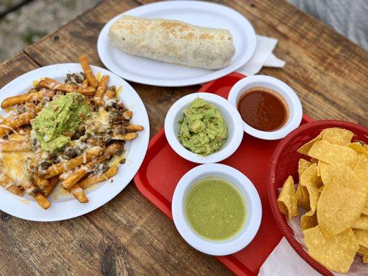 California Burrito, Carne Asada Fries (w/out sour cream), & Chips, Guacamole, and Salsa.