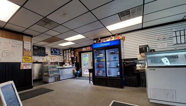 Why are the stuffed animal chickens on top of the beverage cooler?