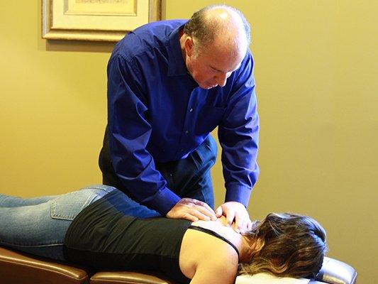 Dr. David Dagen adjusts a patient at Smyrna Chiropractic.