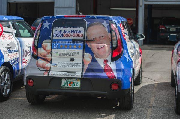 The company car wrap for Joe Manausa Real Estate