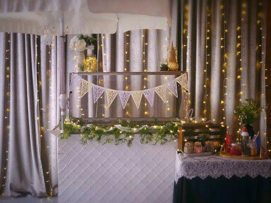 Formal ice cream cart for wedding with mini sundae toppings bar.