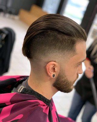 Barber: Oliver. Men's undercut with fade and beard clean up.