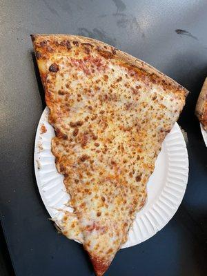 Cheese slice is quite large, crispy crust, decent pizza for a hungry Giants fan after a game