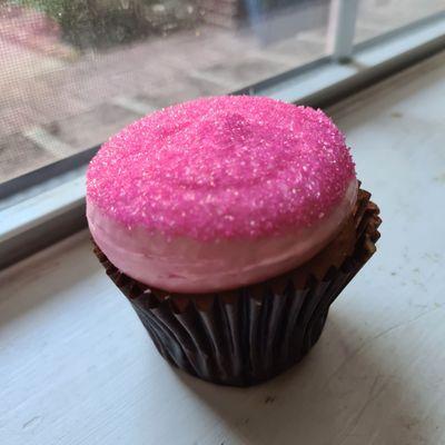 Side pink vanilla cupcake