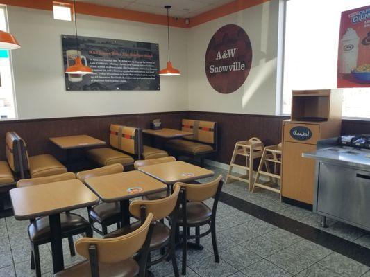 Dining area inside. Tables out front for take-out orders