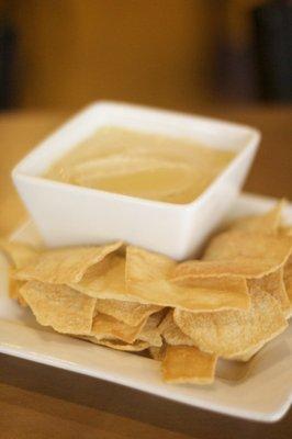 our Hummus is made in house & is served with pita chips.