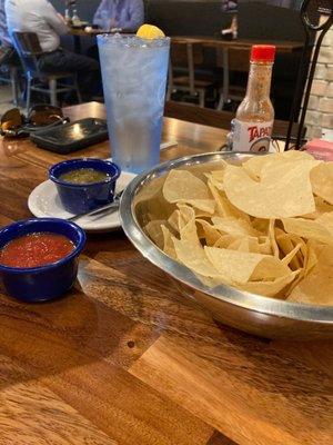 Chips and salsa including the you have to ask for it green hot and flavorful salsa