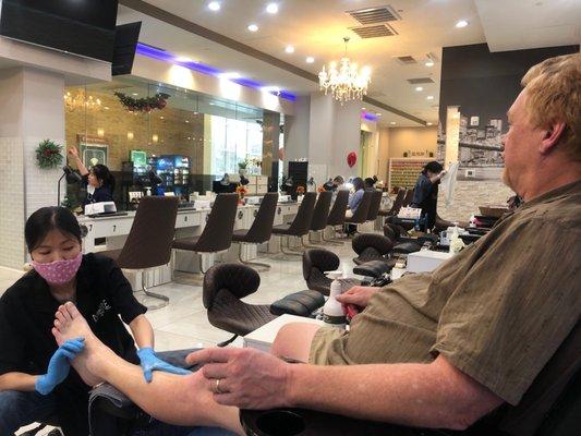 My husband getting a pedicure