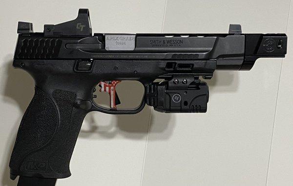 S&W M&P9 M2.0 PC 5" with Apex flat-faced, forward set red freedom edition trigger & Apex Grade semi drop-in 5.5" threaded barrel.