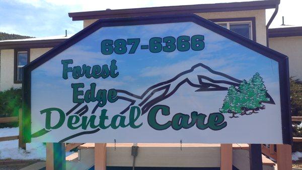 This is the front sign for Forest Edge Dental Care in Woodland Park.