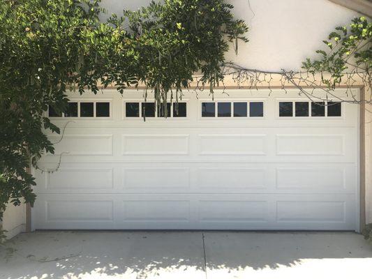 Standard residential And custom doors installed by           Conejo Genie Door