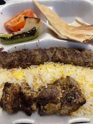 Chelo & Lamb kebab with saffron rice, roasted tomato, onion, bell pepper, and some pita flatbread