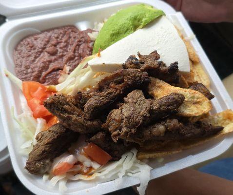 Carne Asada: beans, rice, plantains, coleslaw, and beef