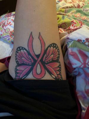 Tom's tattoo. One of the ones he did. Breast cancer fighter.