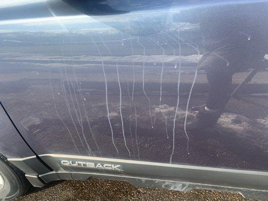 White streaks on outside the car