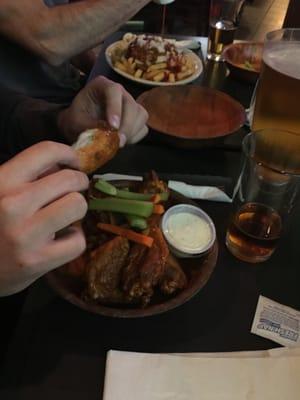 Perhaps the best wings you'll find in the Western 'burbs. And yes... that's a garbage plate in the background. Your eyes do not deceive you.