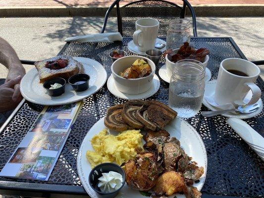 French toast with a whiskey honey syrup and eggs, potatoes and home fries.