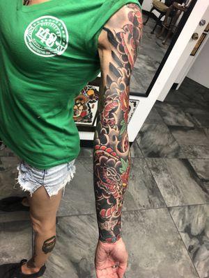 My wife/ tattooer Kookies Snake and peony sleeve!