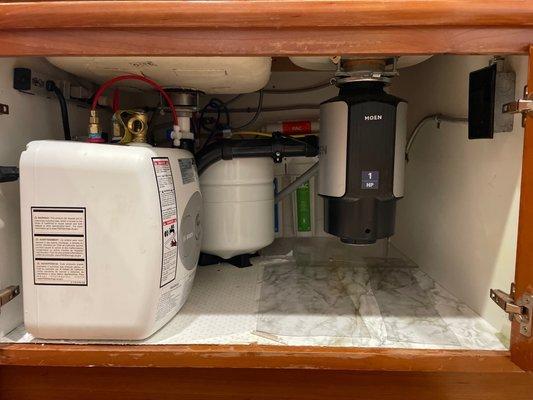 Nathaniel installed a new garbage disposal, new reverse osmosis system, new cold and instant hot water tank under our sink.