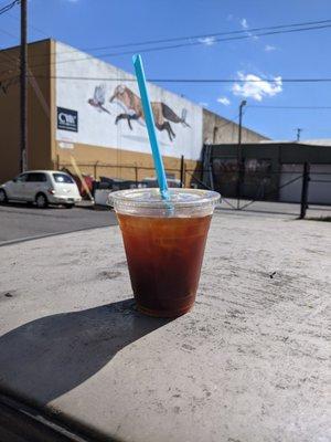 Iced Americano on the (dirty) roof of my friend's car lol.