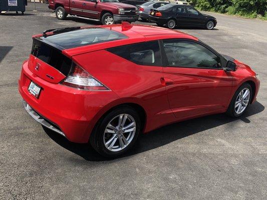 Here is a Honda CR-Z we painted. It had got slammed in drivers door and fender! Repaired back to factory specs!