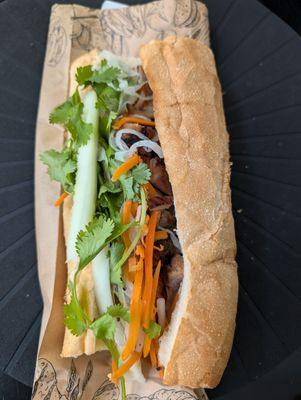 Grilled chicken banh mi  There is more chicken under the veggies than the picture shows. Fyi