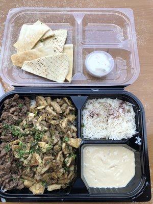 Chicken and steak shawarma plate with extra rice and hummus