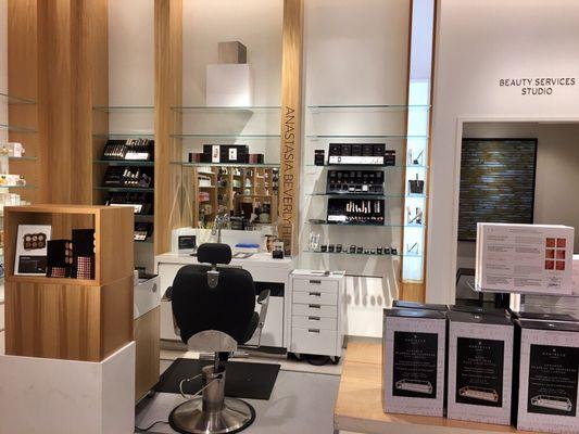 Located on the first floor in the back corner of the cosmetics department near fine fragrance.