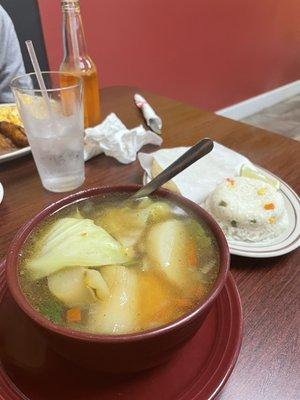 Caldo de Res with habanero sauce, rice & tortillas