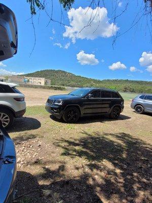 The parking lot looking towards the end of the property