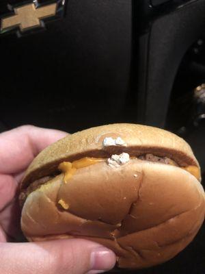 Something on/baked in the cheeseburger