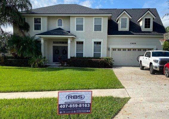 Roof replacement in Clermont, Florida. Black roof with black drip edge.