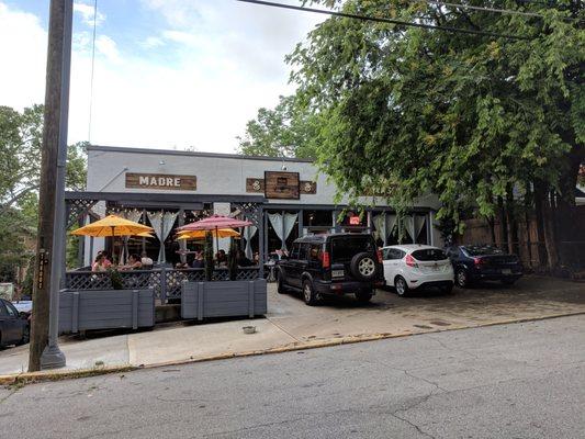 Outside. Storefront. Very small parking lot, but there's plenty of street parking. Nice patio.