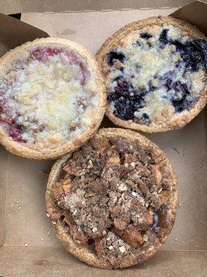 Rhubarb, blueberry, and apple pie! All small 5 inch pies :) bigger pies are available but I wanted a slice of each