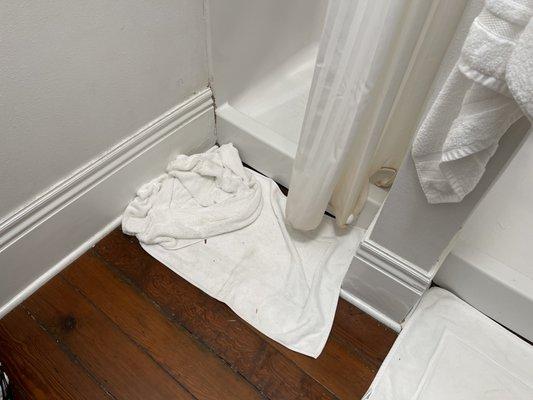 The shower floor towels.