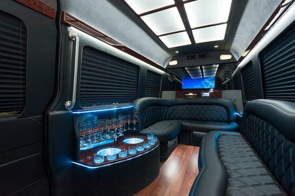 Interior of the Mercedes Sprinter limo with seating for 12 people.