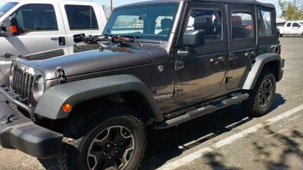 Aries 3 Inch Pro Series Step Bars on a Jeep Wrangler. Installed at our Tucson, AZ location.