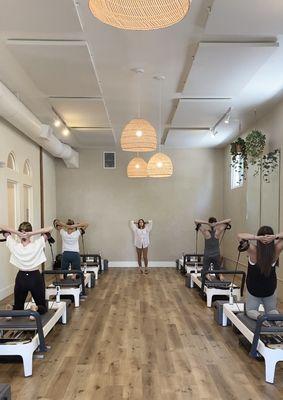 Group class in Reformer Studio