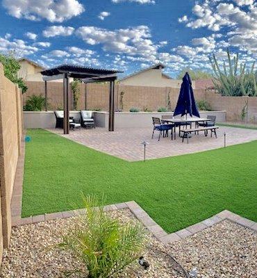 Free standing pergola, synthetic turf, paver border, paver pad