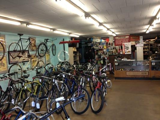 Cool old shop on the basement/back side of building.  Antique bikes on the wall, old cruisers and road bikes for sale.