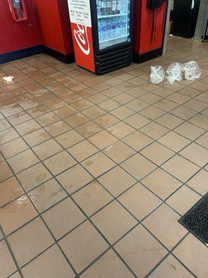 Staff are just throwing garbage on the floor and stacking personal drinks around the register.