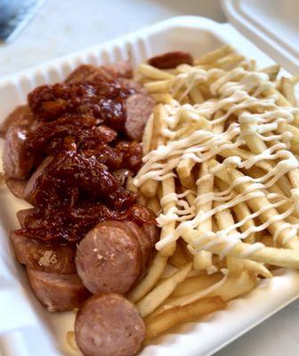 Try their CURRYWURST! It's the best, as well as their cold cut sandwiches and brats  Ps. They're also in Long Beach @ Bixby park