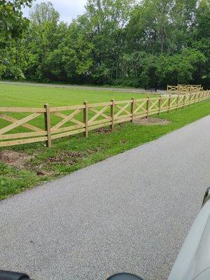 custom treated wood horse rail fence  installed
in Washington ,Mo 63090 by America's fence