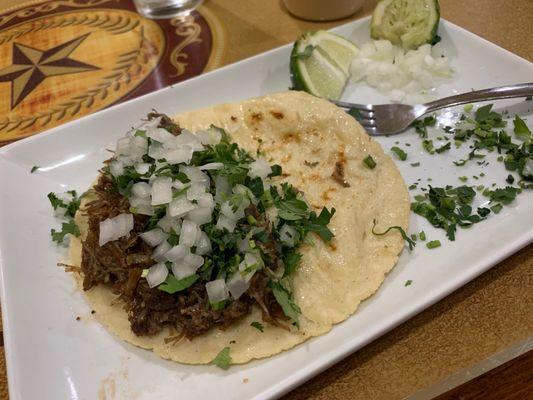 barbacoa taco with lime, onion, and cilantro, red salsa came later!