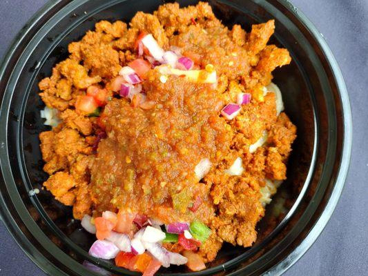 $12 pork bowl , 90% rice and vegetables -primarily onions and tomatoes