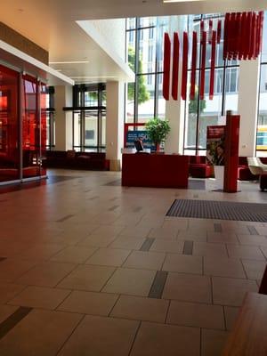 Red cubicles and red ceiling art