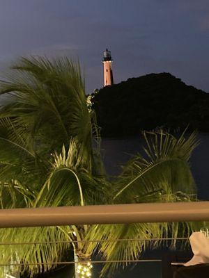 Jupiter lighthouse with limited beacon light seen from Topside at the Beacon