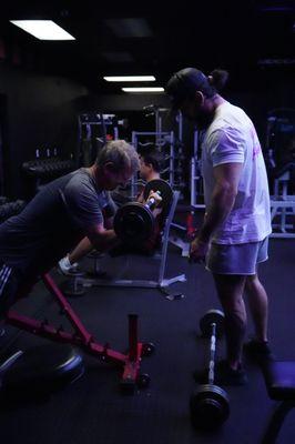 Coach Jae training a client in our Men's Group Training class